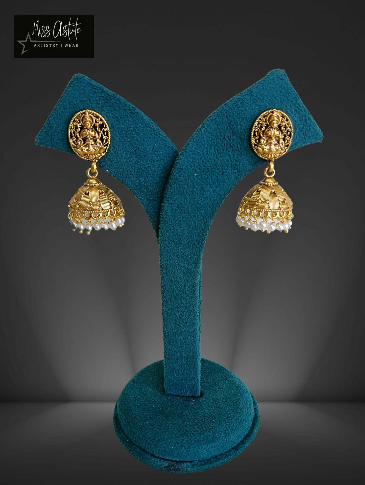 Gold-Toned Temple Jhumkas with Goddess Lakshmi Carving