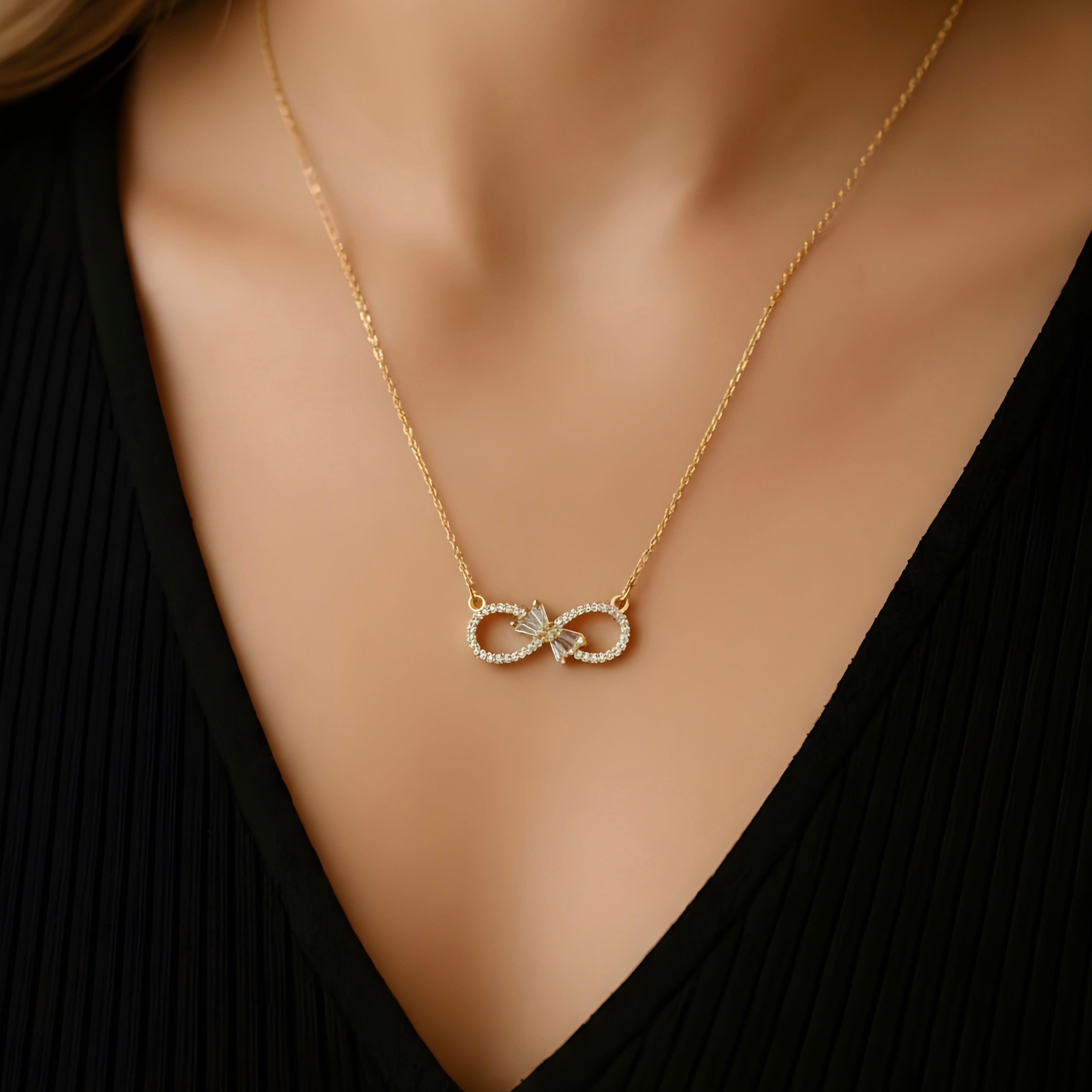 Infinity Bloom – Zircon Bow Necklace