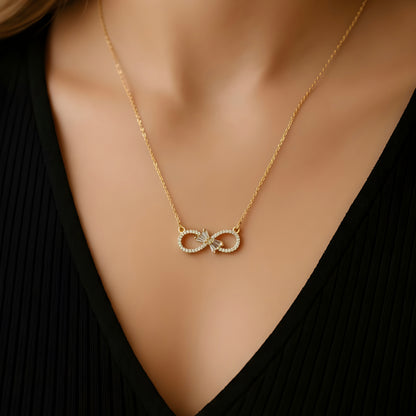 Infinity Bloom – Zircon Bow Necklace